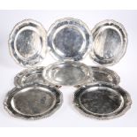 A SET OF EIGHT GEORGE III SILVER DESSERT PLATES