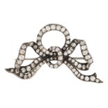 A DIAMOND RIBBON BOW BROOCH