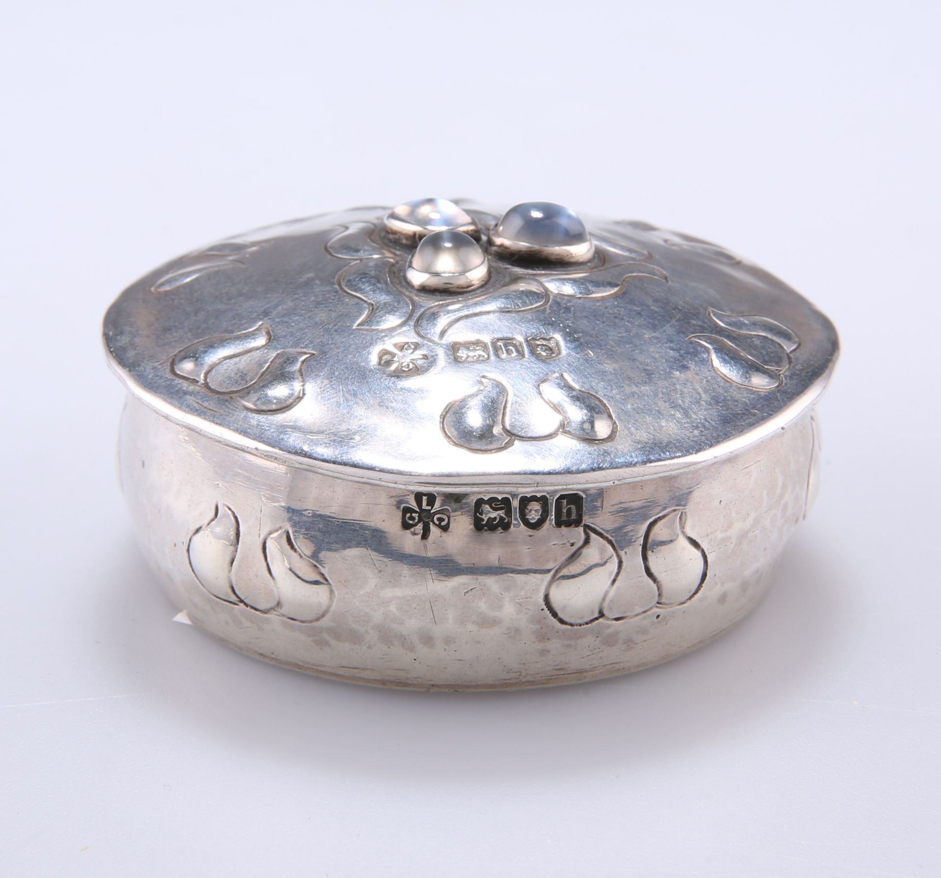 AN ARTS AND CRAFTS SILVER AND JEWELLED BOX