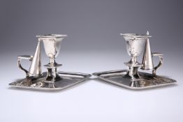 A PAIR OF GEORGE III CHAMBERSTICKS