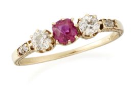 A RUBY AND DIAMOND THREE STONE RING