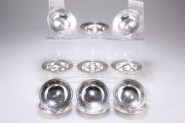 A SET OF TWELVE SILVER ARMADA DISHES