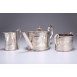 A VICTORIAN SILVER THREE-PIECE TEA SERVICE