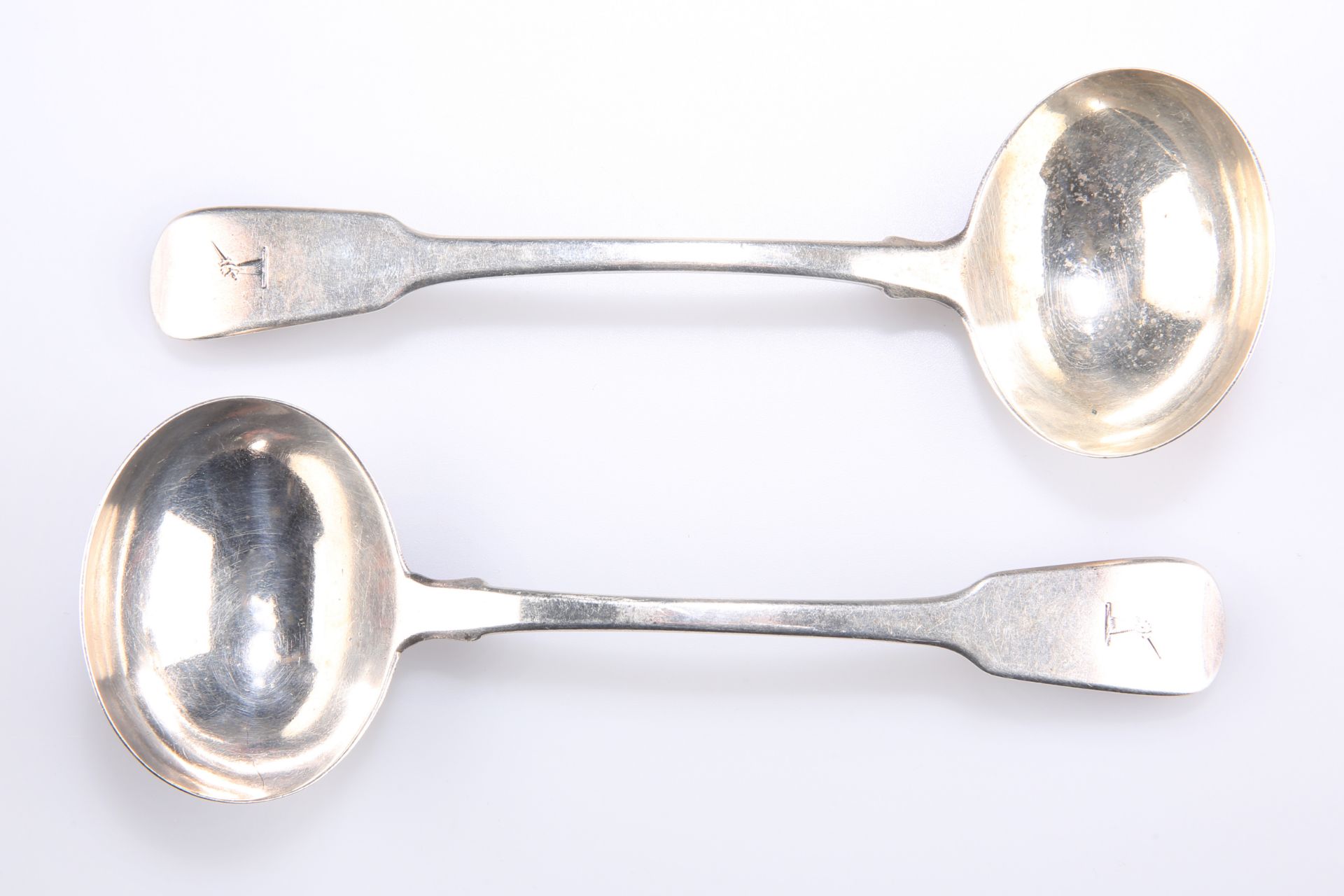 A PAIR OF GEORGE IV SILVER SAUCE LADLES