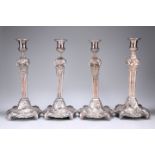 A SET OF FOUR OLD SHEFFIELD PLATE CANDLESTICKS