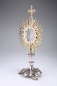 A CONTINENTAL GILT AND SILVERED METAL ECCLESIASTIC MONSTRANCE