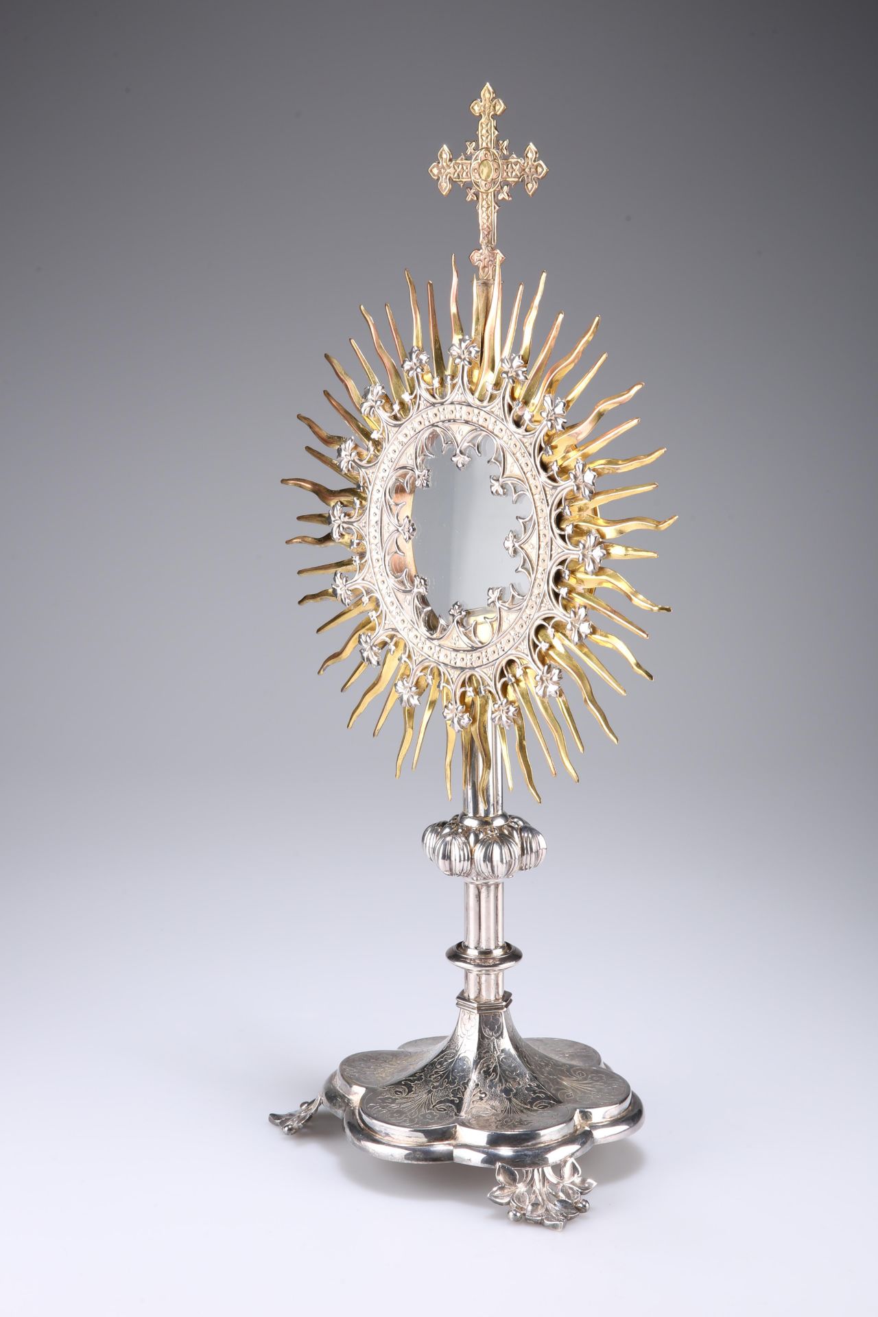 A CONTINENTAL GILT AND SILVERED METAL ECCLESIASTIC MONSTRANCE