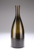 A MID-19TH CENTURY GREEN GLASS WINE BOTTLE, with partially fluted neck and unusually deep kick-in