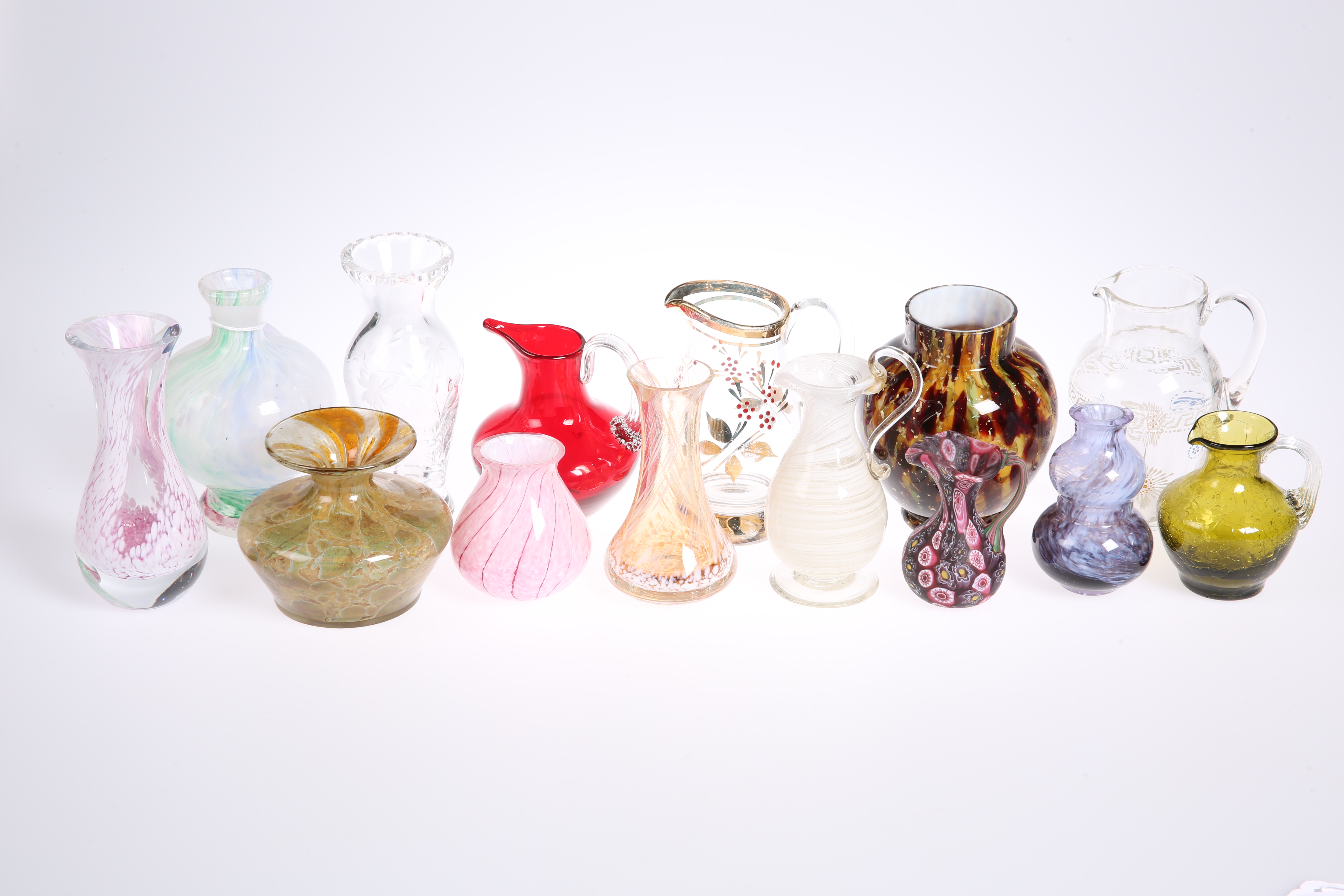 Fourteen pieces of Victorian and later glass inc. Caithness vase, small millefiore jug, etc (15)