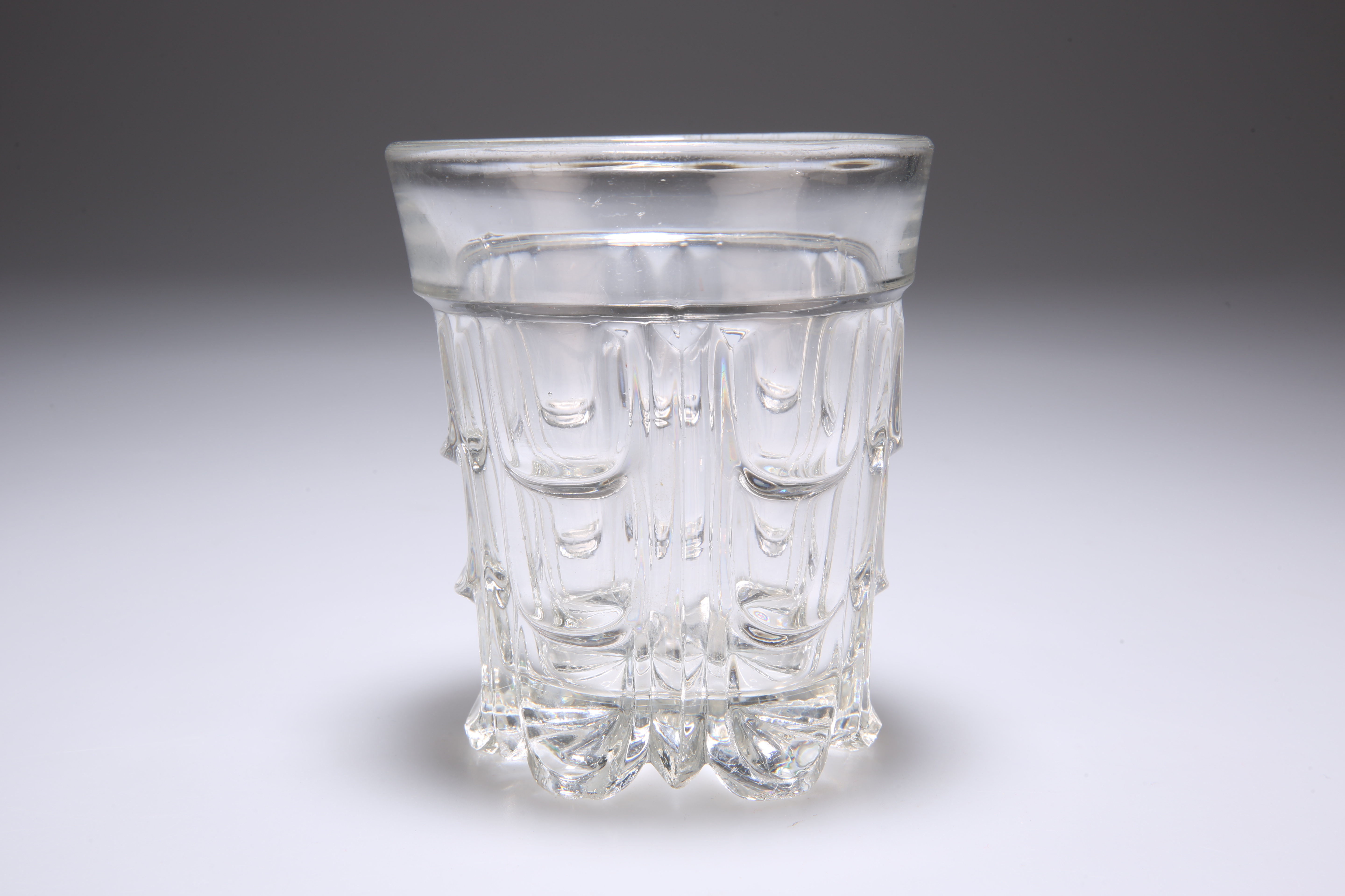 A 19TH CENTURY GLASS WATER TUMBLER, PROBABLY BACCARAT, with six segments of three graduating