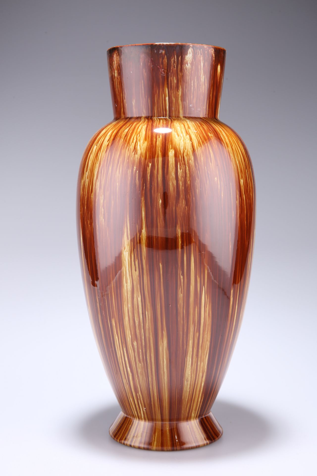 A LARGE LINTHORPE POTTERY VASE, of baluster form, with streaky brown glaze, impressed no. 477 and