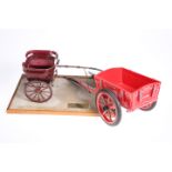 A model of an Offord Governess Cart, on a plinth base with brass plaque inscribed 'Offord