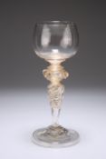 A VENETIAN GLASS GOBLET, CIRCA 1880, the cup-shaped bowl on a double ringed neck above four plain