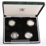 A SET OF FOUR UK SILVER PROOF ONE POUND COINS, in Royal Mint case, comprising 1996, 2002, 2001 and