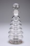 A rare beehive form cordial decanter, 19th century, the ribbed body formed from six graduated