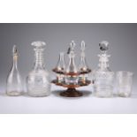 A collection of 18th century and later glass, including cruet set on a revolving stand, vinegar