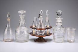 A collection of 18th century and later glass, including cruet set on a revolving stand, vinegar