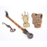 Four tribal pieces including, a benin bronze bust, an iron ladle, etc, ladle 45.5cm long