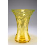 A Thomas Webb & Sons Gay Glass vase, of waisted form, in amber glass with optic moulded waves,