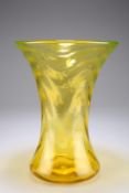 A Thomas Webb & Sons Gay Glass vase, of waisted form, in amber glass with optic moulded waves,