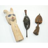 Three carved tribal masks, taller 76cm