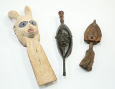 Three carved tribal masks, taller 76cm