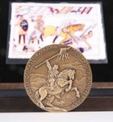 A BATTLE OF HASTINGS 950TH ANNIVERSARY BRONZE MEDALLION AND FABRIC PANEL, boxed