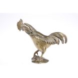 A VICTORIN BRASS VESTA, in the form of a cockerel, with hinged back. 13.5cm