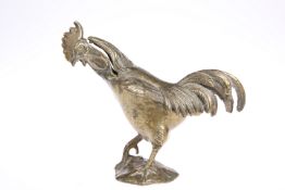 A VICTORIN BRASS VESTA, in the form of a cockerel, with hinged back. 13.5cm