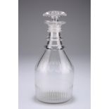 A 19th century spirit or cordial decanter, the body with slice cut shoulder and triple ring neck,