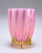A late 19th century Stourbridge posey vase, the pearlesant ruby bowl raised on applied green glass