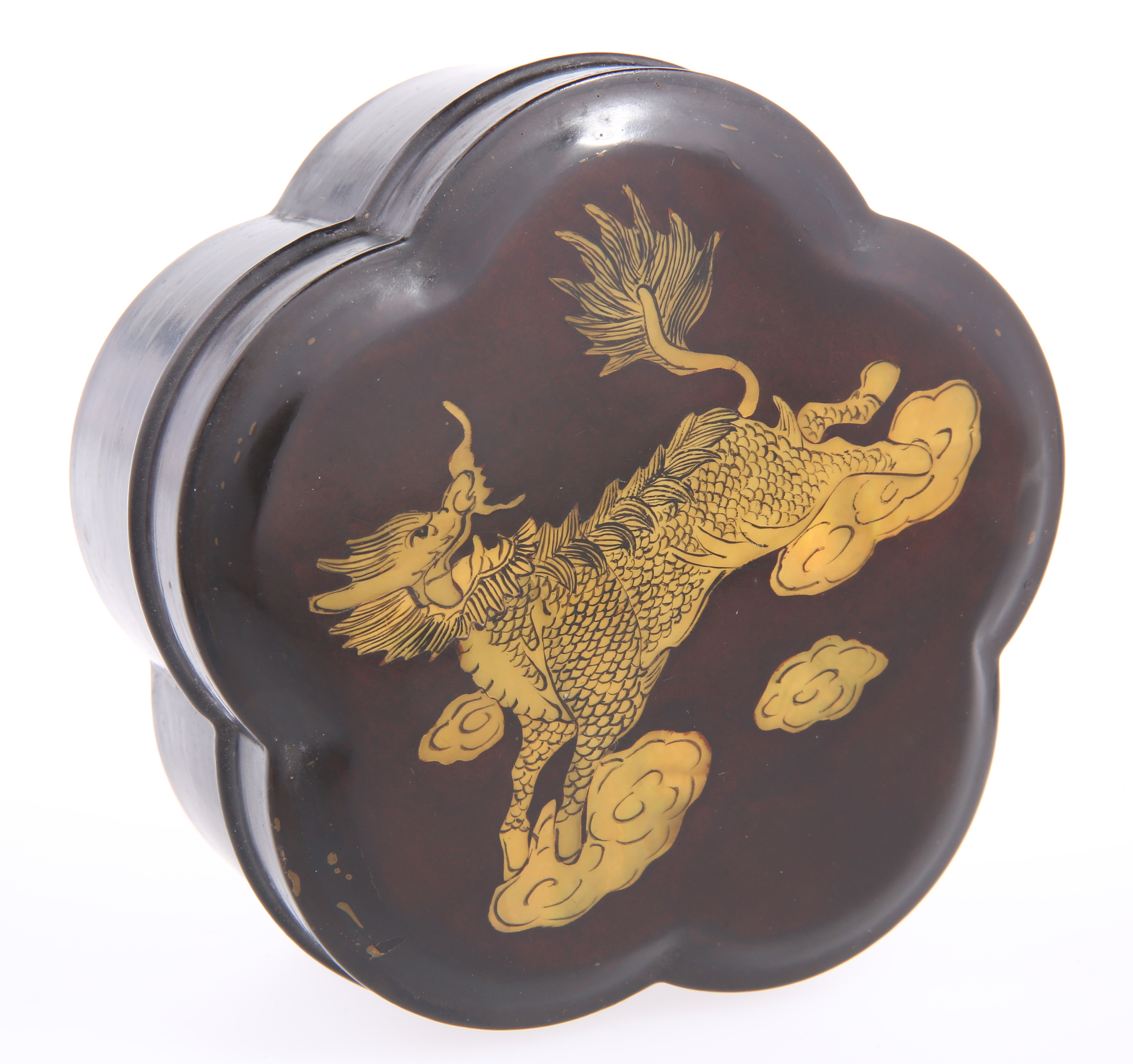 A Chinese lacquer box and cover the lift off lid inlaid with a Qilin, 11cm diameter