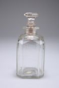 A late 18th century cut glass liqueur bottle, with sliced cut shoulders and corners, engraved