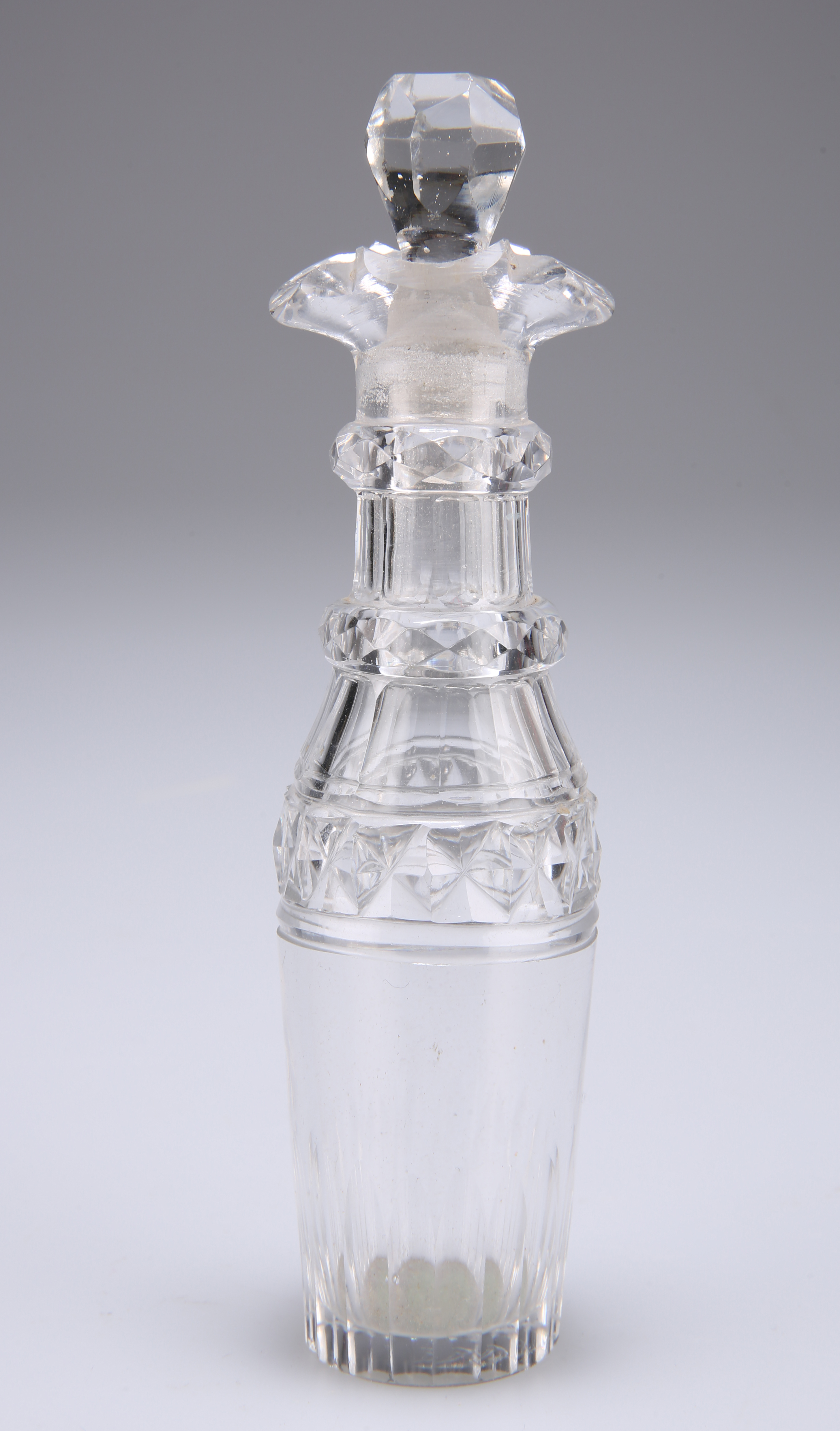 A small late Victorian cut glass scent bottle, 15cm high