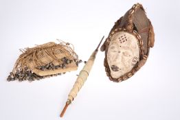 A tribal shell clad mask; together with a bag, etc (3)