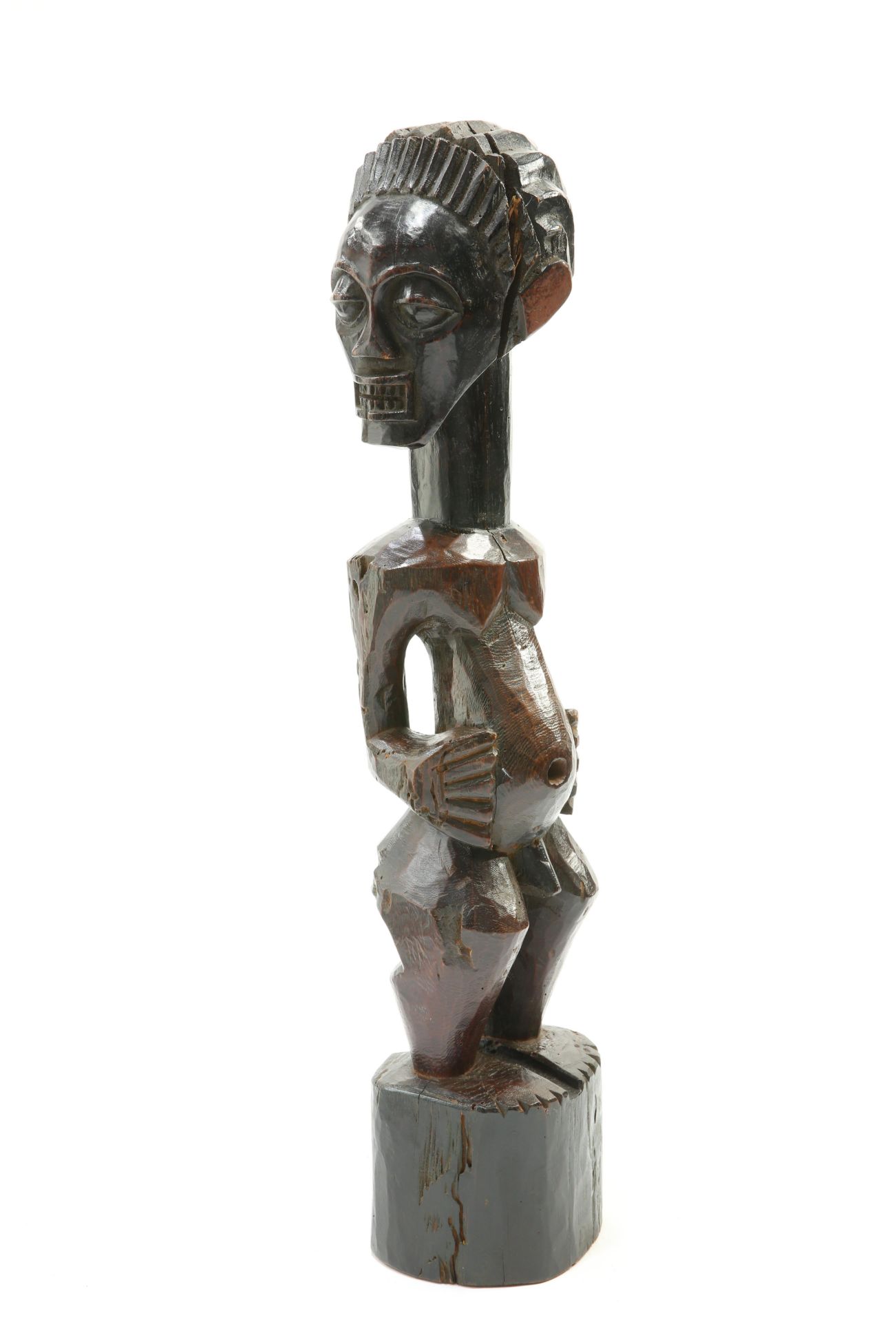 A tribal carved figure, 69cm high