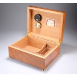 A REUGE MUSIC BURR WOOD MUSICAL HUMIDOR. 29.5cm wide