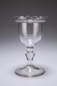 A SWEETMEAT GLASS, CIRCA 1765, the ogee bowl with frilled rim, raised on a baluster stem. 15.5cm