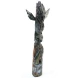 A large tribal figural and animal carving, 172cm high