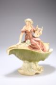 A ROYAL DUX CENTREPIECE, modelled as a Classical maiden holding a lyre seated on the edge of a conch