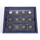 A SET OF TWELVE CHINESE ZODIAC ANIMALS SOMALIAN 10 SHILLINGS COINS, boxed