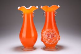 TWO GLASS VASES, each cased body with orange ground and applied with twin handles, one with