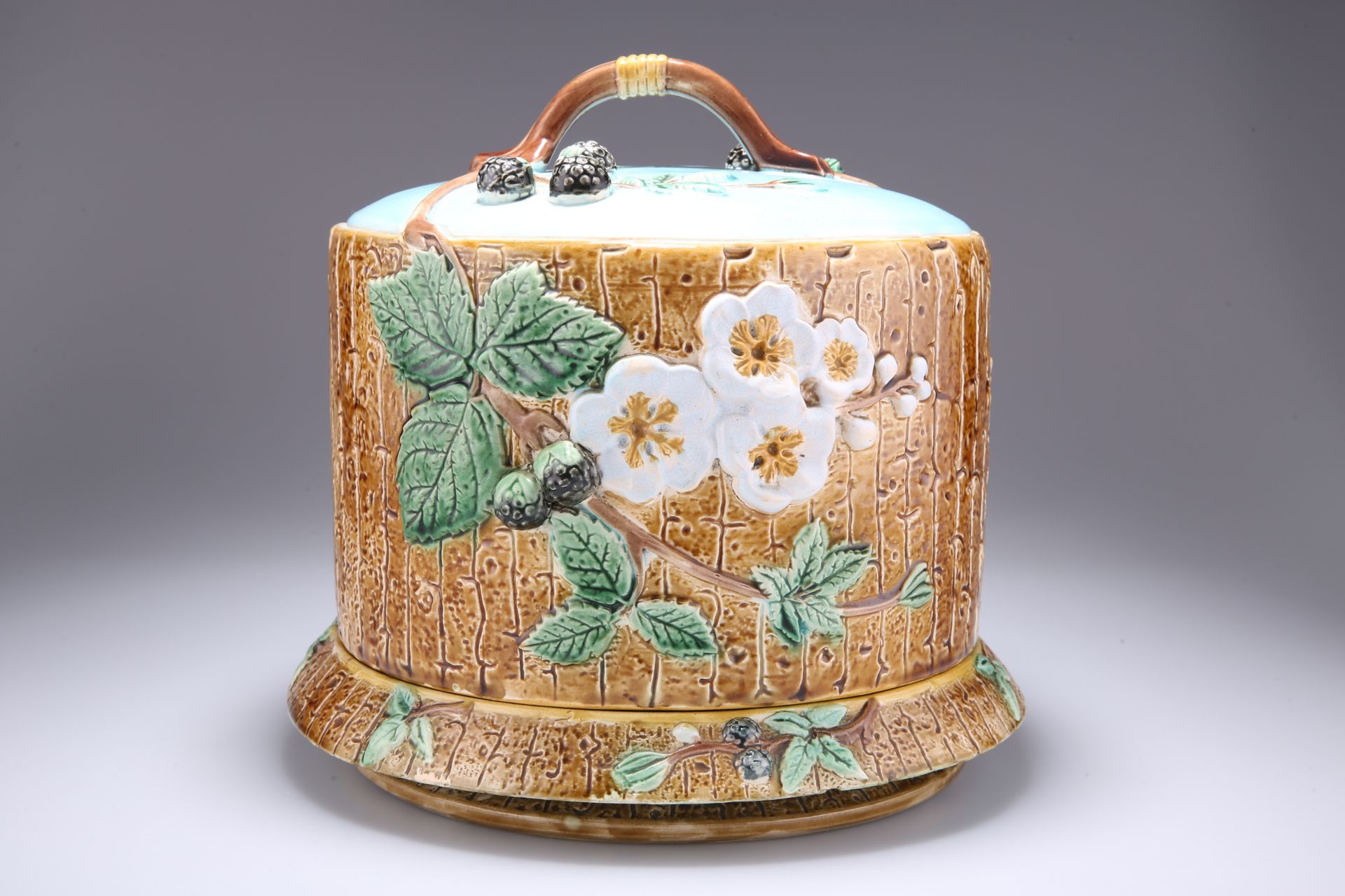 JOSEPH HOLDCROFT, A MAJOLICA CHEESE DOME AND UNDERPLATE, CIRCA 1880
