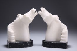 A PAIR OF ALABASTER BOOKENDS, PROBABLY ITALIAN, EARLY 20TH CENTURY