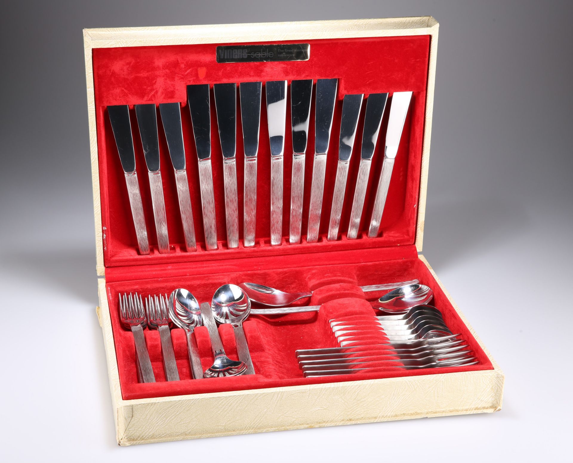 GERALD BENNEY (1930-2008) A VINERS STAINLESS STEEL SABLE PATTERN 38 PIECE CUTLERY SERVICE