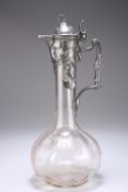 WURTTEMBERGISCHE METALLWARENFABRIK (WMF) AN ART NOUVEAU GERMAN SILVERED METAL MOUNTED CLARET JUG