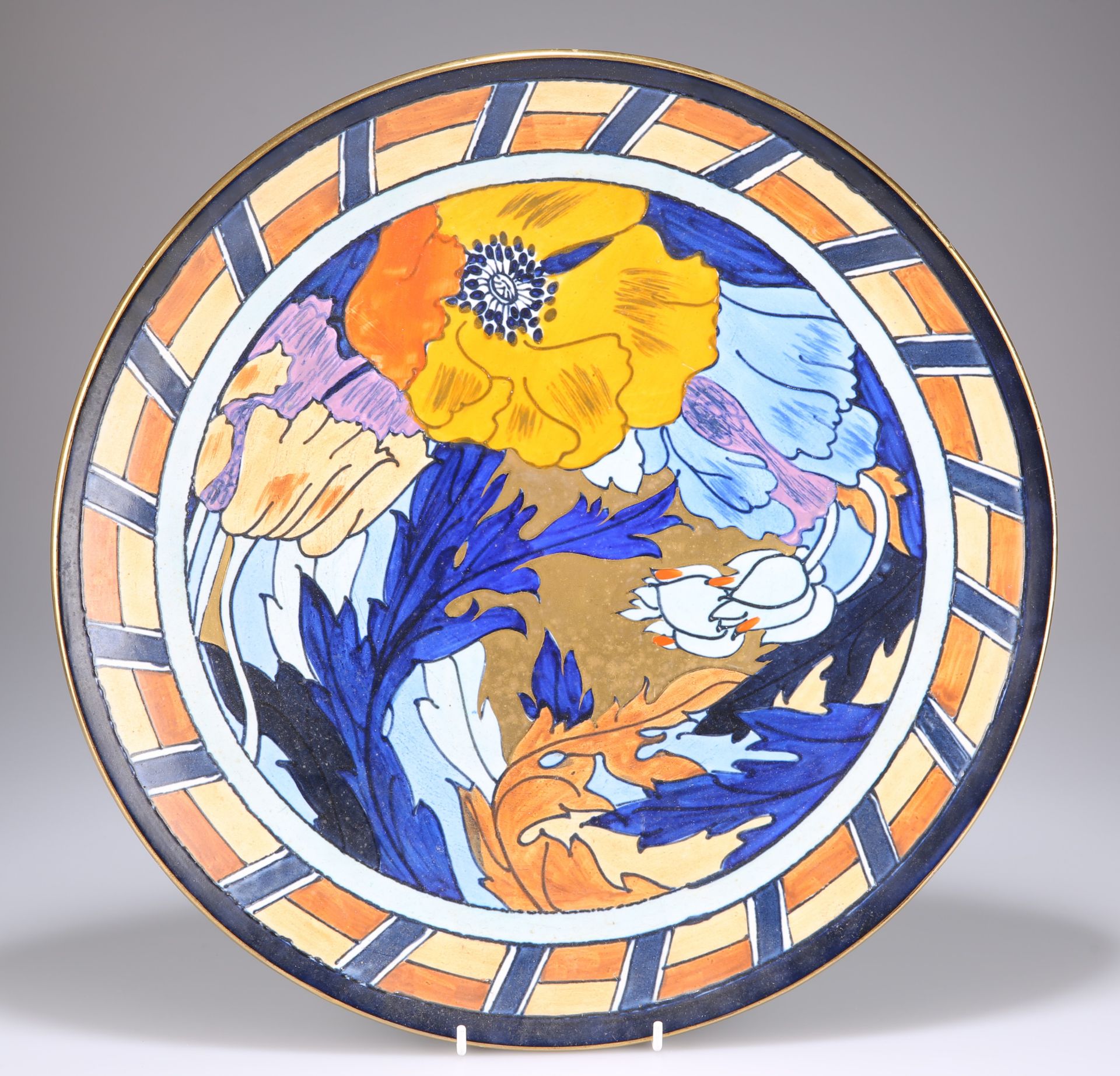 A WOOD & SONS POTTERY CHARGER, DESIGNED BY CHARLOTTE RHEAD