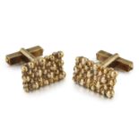 A PAIR OF SILVER GILT CUFFLINKS, BY STUART DEVLIN