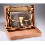 LOUIS VUITTON SOLOGNE SHOULDER BAG, in monogrammed canvas with light tan trim and shoulder strap,