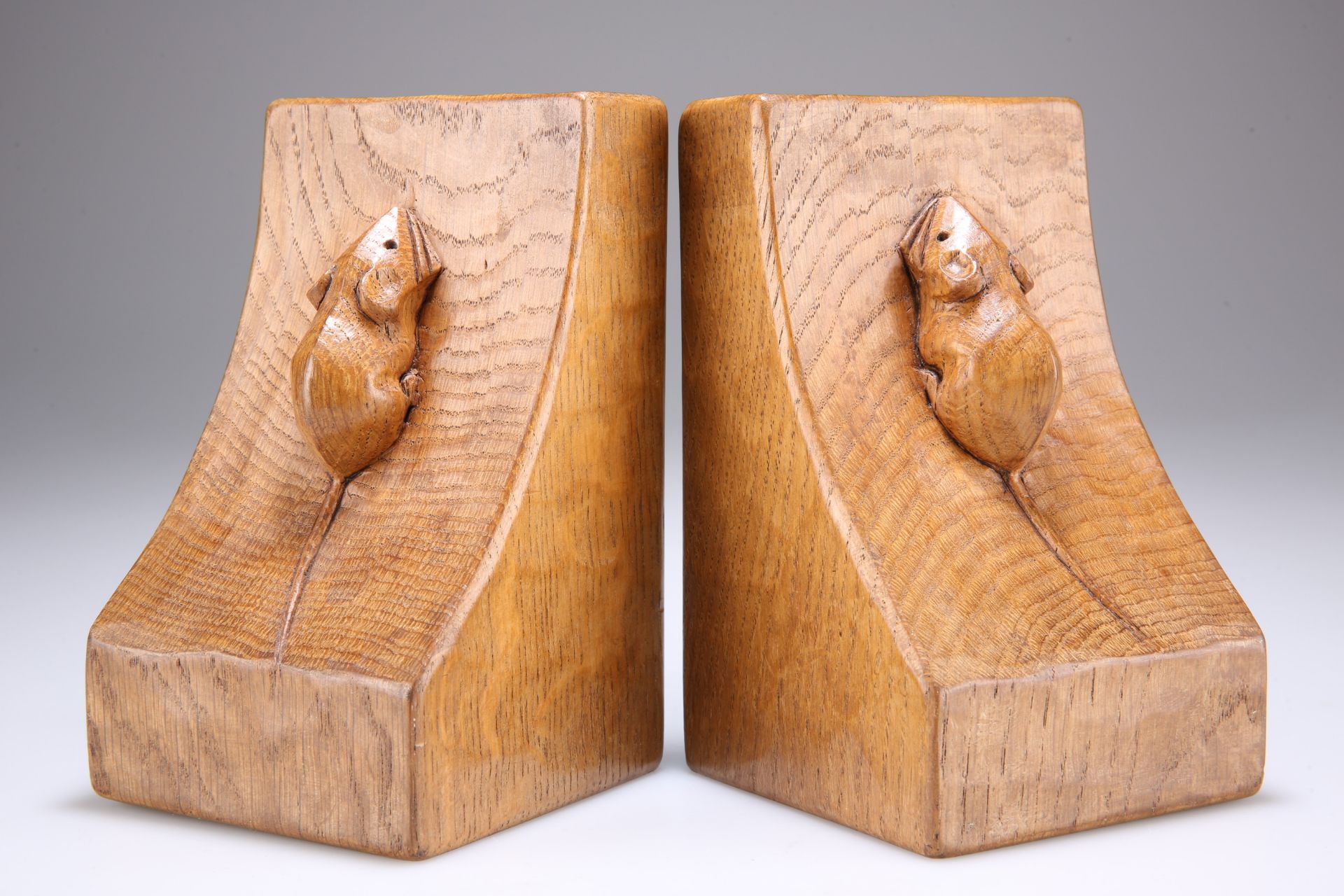 ROBERT THOMPSON OF KILBURN, A PAIR OF MOUSEMAN ADZED OAK BOOKENDS